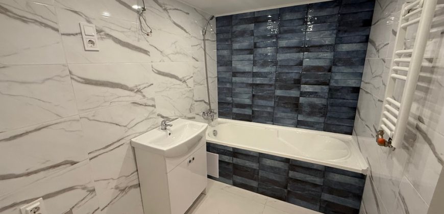 Eladó modern, fiatalos lakás kertkapcsolattal a 15. kerületben!