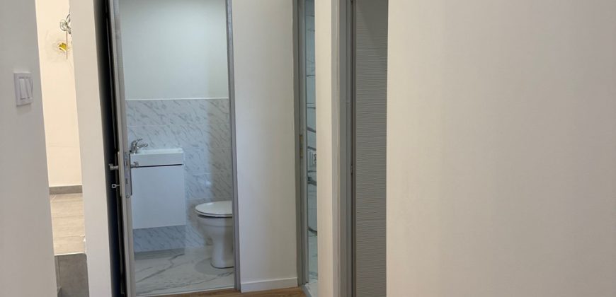 Eladó modern, fiatalos lakás kertkapcsolattal a 15. kerületben!