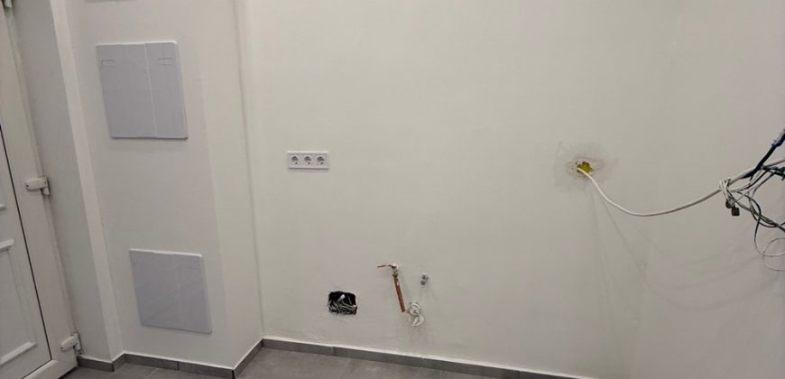 Eladó modern, fiatalos lakás kertkapcsolattal a 15. kerületben!