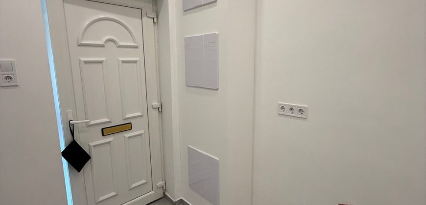 Eladó modern, fiatalos lakás kertkapcsolattal a 15. kerületben!